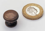 Miniature Cabinet Knobs in Antique Brass