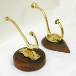 Brass Hooks, circa 1910 on Wooden Backing