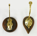 Brass Hooks, circa 1910 on Wooden Backing
