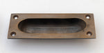 Oval Recessed Sliding Door Pull in Antique Brass